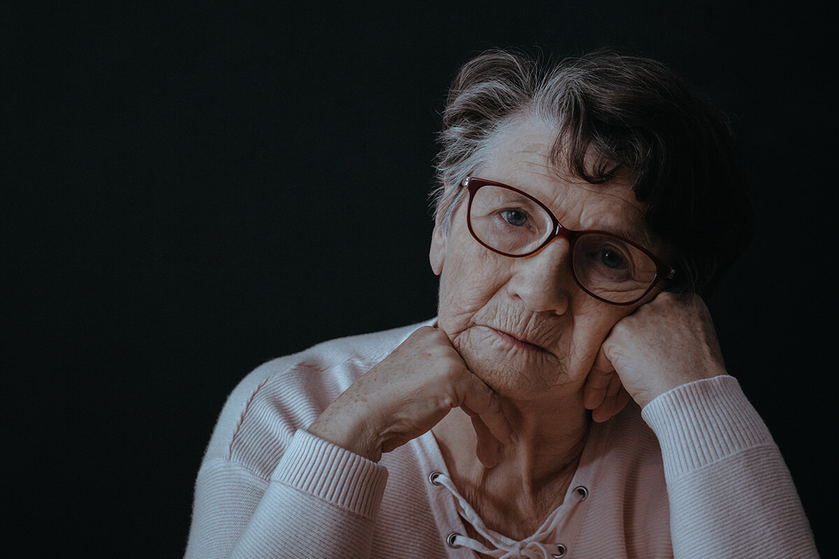 social isolated old woman wearing glasses